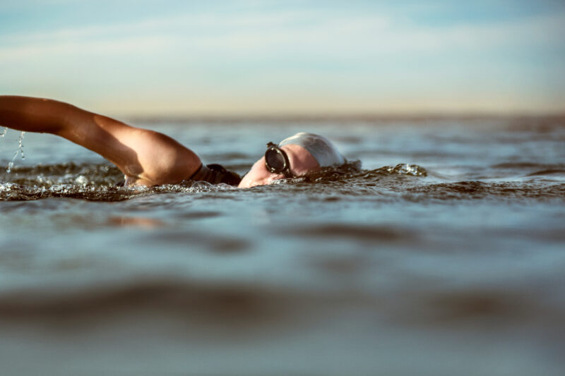 Woman swimming in sea